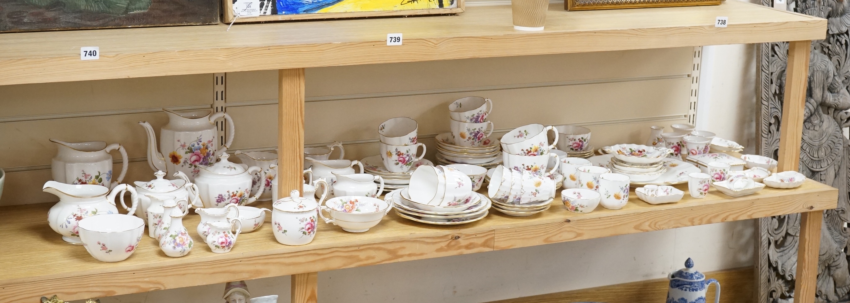 An extensive Crown Derby Posies pattern service to include trios, teapot, jugs and miniatures